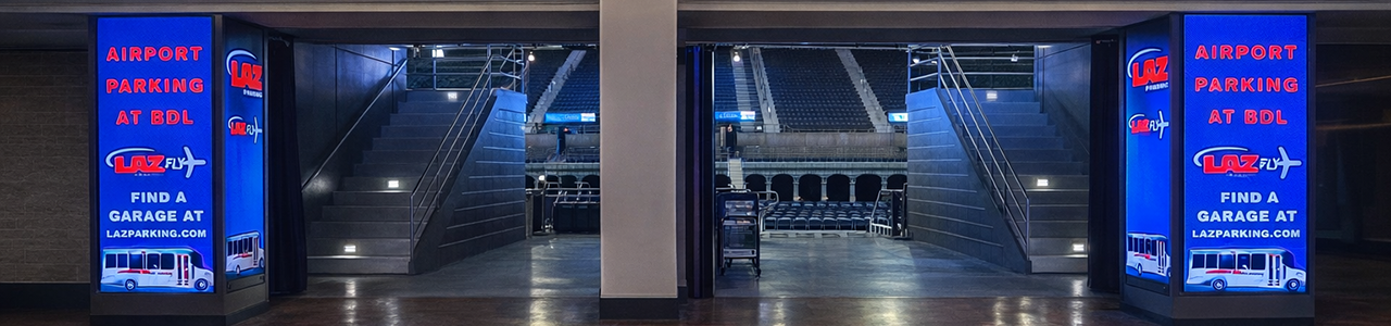 Corner LED displays by the entrance to the arena