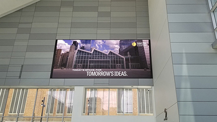 javits-430×242 Digital screen hanging in the lobby of the Jacob K. Javits Convention Center in New York City